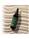 Bottle of 5 Ginseng tincture on a striped fabric background