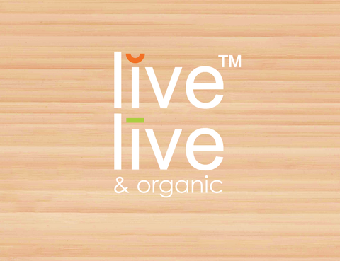 live live & organic logo on a bamboo wood background