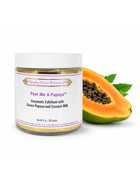 Jar of 'Peel Me A Papaya' exfoliant with a halved papaya on a white background, Simply Divine Botanicals