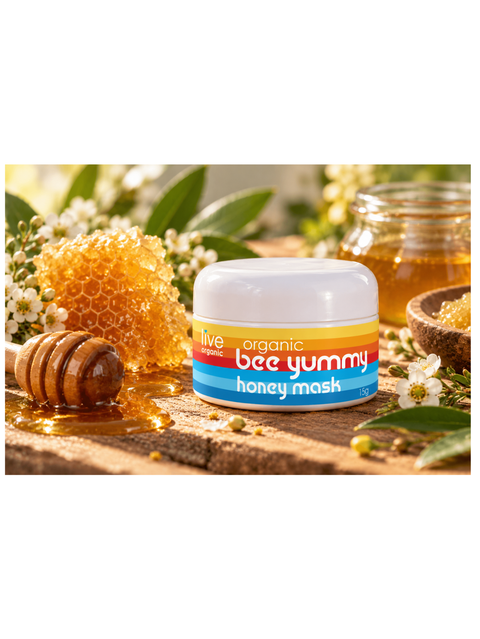 bee yummy honey mask, by live organic, placed among some of it's ingredients, mainly honey.