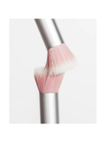 Blush Brush, RMS Beauty with pink bristle head on a white background