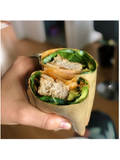 Coconut Wraps, Organic & Vegan, NUCO, someone holding a filled wrap cut in half