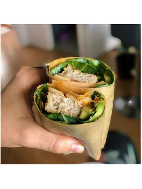 Coconut Wraps, Organic & Vegan, NUCO, someone holding a filled wrap cut in half