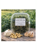 Garlicky Kale Chips packaging with garlic bulbs on a wooden surface and field background
