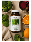Iron Response, 90 Tabs, Innate Response Formulas, laying with ingredients on a table