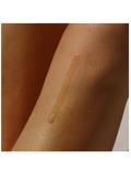 Close-up of a droplet of liquid on skin