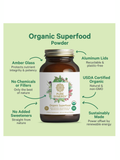 Bottle of Pure Synergy Organic Superfood Powder with green label on a light green background
