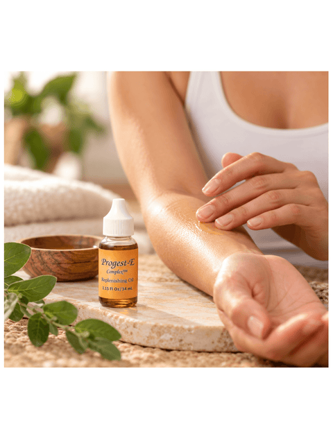 A customer rubbing a drop of progest E into their arm