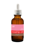 Bottle of Live Organics raw wild rosehip oil with a dropper on a white background
