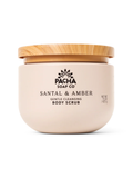 Pacha Soap Co Santal & Amber Gentle Cleansing Body Scrub in a round beige jar with a light wood-grain lid, on a white background.