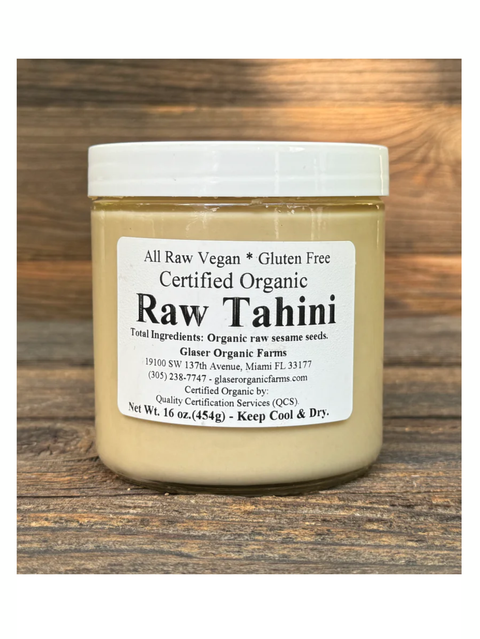 Jar of Tahini, Stone Ground, 16oz, by Glaser Organic Farms on a wooden surface
