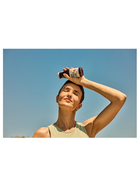 tart cherry juice by Pomona being held by an athlete